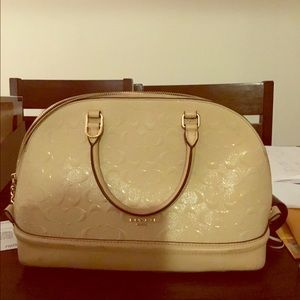 Beige Coach logo bag
